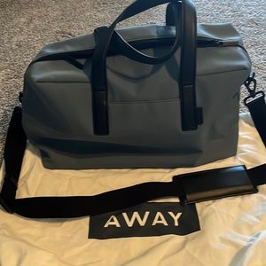 Away original everywhere bag in coastal. Like new condition. No damage